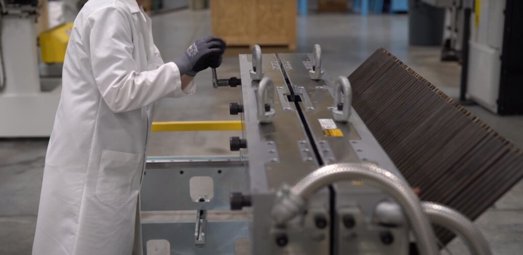Plastic extrusion die being split